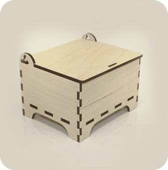 A wooden box with a lid on top of it.