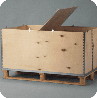 A wooden crate with a lid open on top of it.