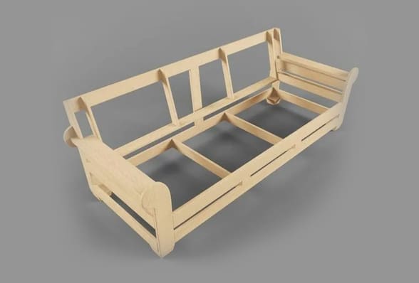 A wooden couch frame with some wood slats